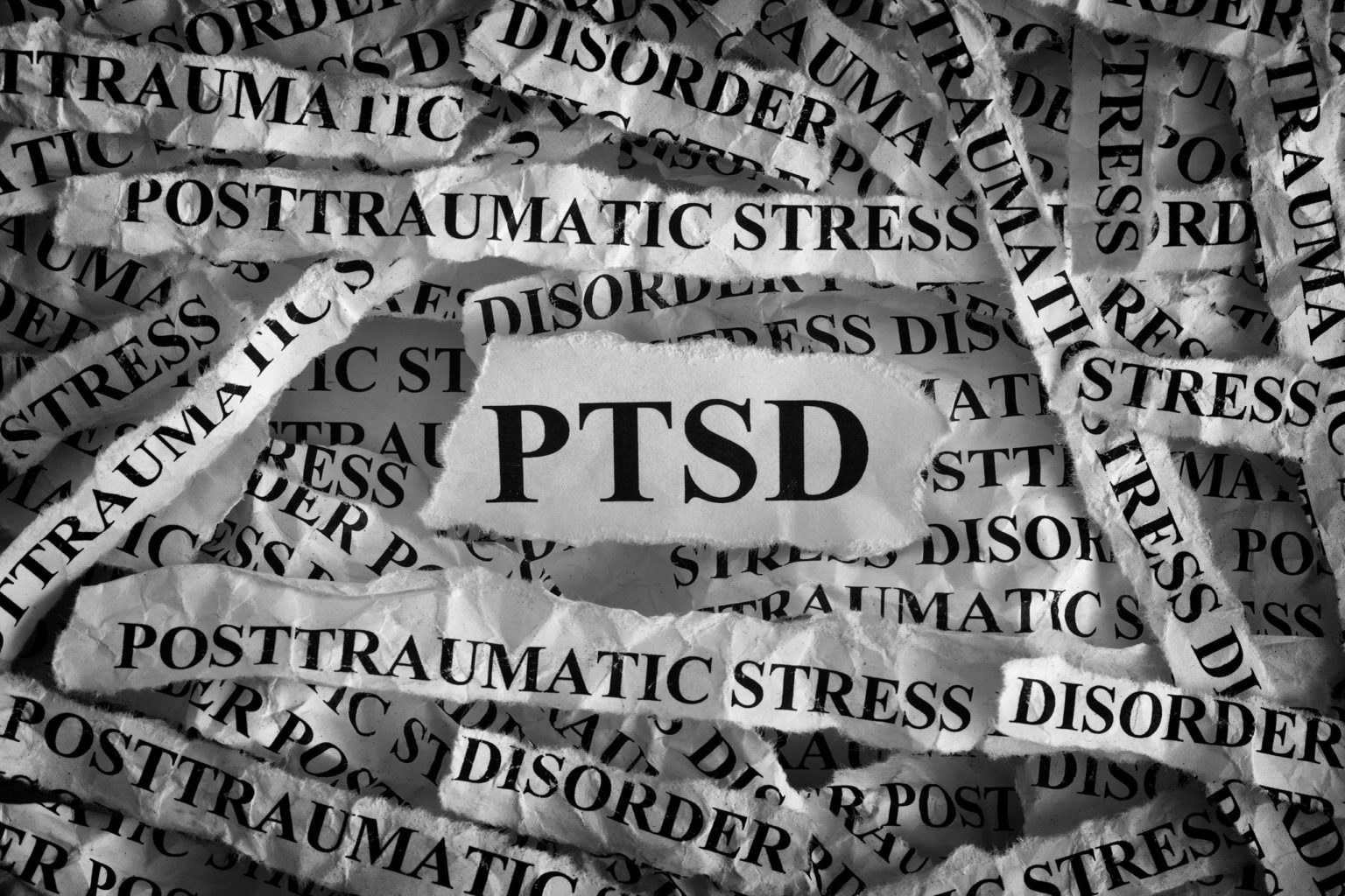 Infographic explaining common PTSD symptoms such as flashbacks, nightmares, avoidance, and hypervigilance.